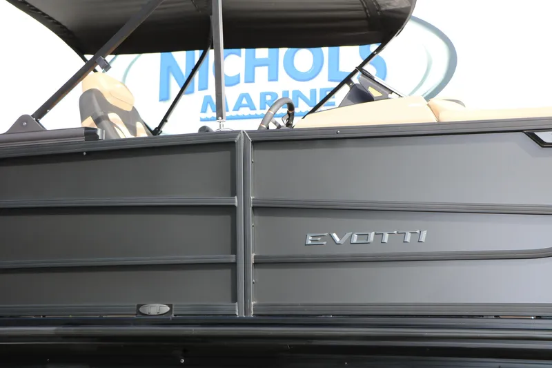 Slide: The Image of 2026 Evotti 725QL boat side view with sleek design and branding. - 14