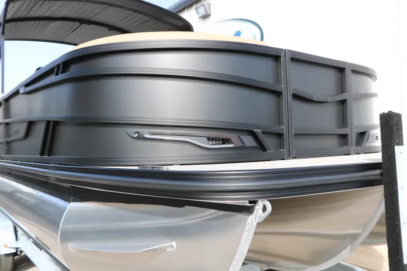Slide: The Image of 2026 Evotti 725QL pontoon boat with sleek black exterior and modern design. - 15