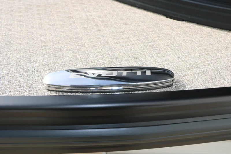 Slide: The Image of Chrome Evotti logo on 2026 Evotti 725QL boat deck. - 18