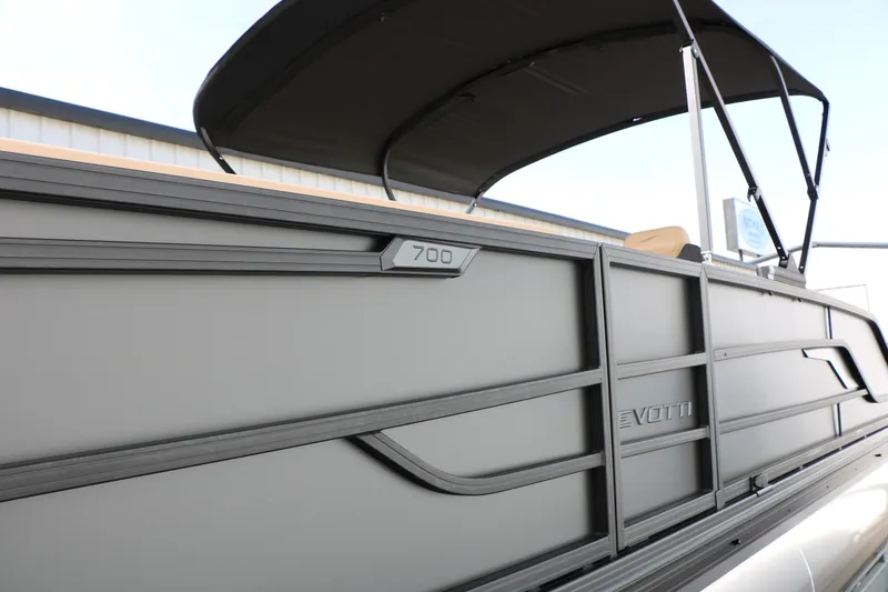 Slide: The Image of 2026 Evotti 725QL boat with sleek design and canopy, side view. - 19