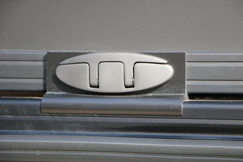 Slide: The Image of Close-up of Evotti 725QL 2026 model latch mechanism on a metallic surface. - 25