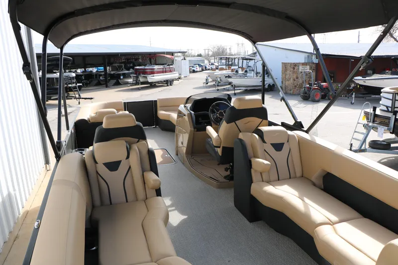 Slide: The Image of Luxurious 2026 Evotti 725QL pontoon boat interior with plush seating and modern design. - 32