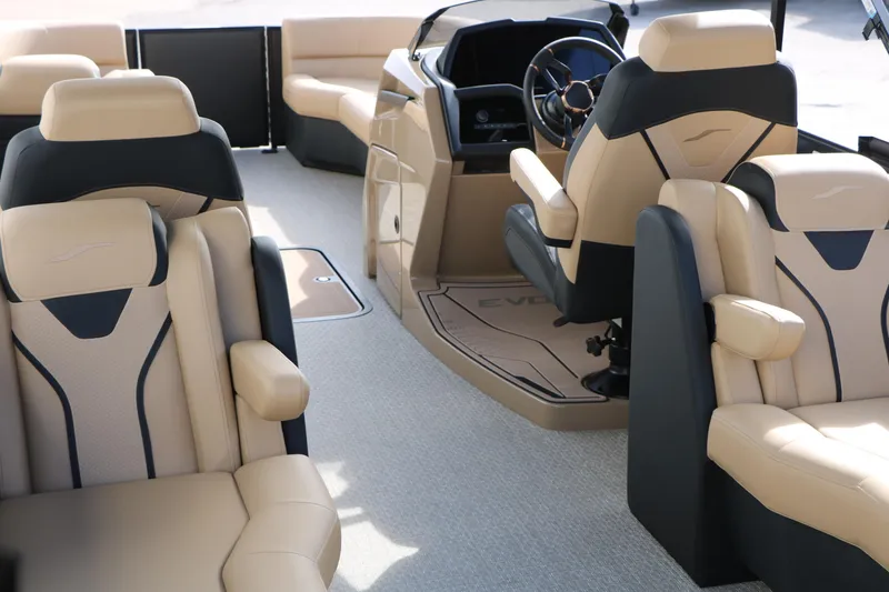 Slide: The Image of Luxurious interior of 2026 Evotti 725QL boat with plush seating and modern dashboard. - 33