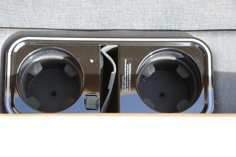 Slide: The Image of Cup holders in 2026 Evotti 725QL car interior, featuring sleek design and functionality. - 48