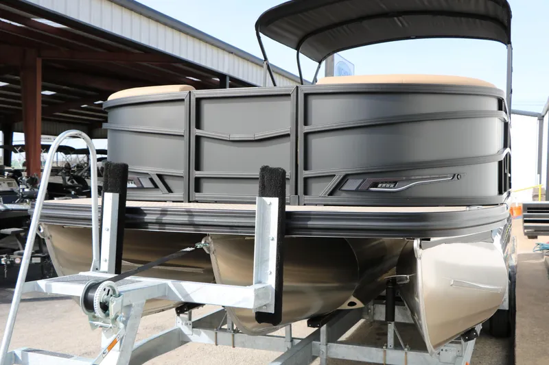 Slide: The Image of 2026 Evotti 725QL pontoon boat on trailer, showcasing sleek design and modern features. - 5