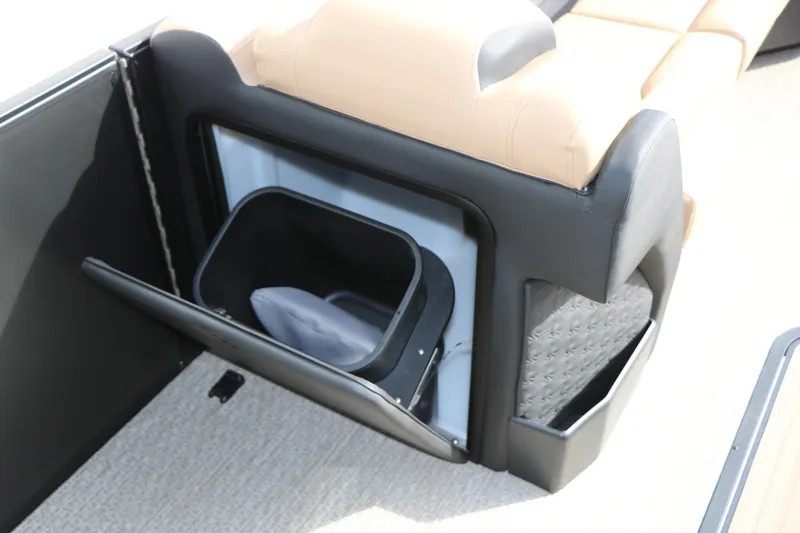 Slide: The Image of Interior storage compartment of 2026 Evotti 725QL boat with beige seating. - 54