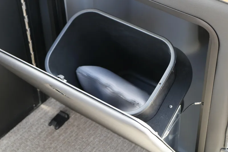 Slide: The Image of Open storage compartment in Evotti 725QL, 2026 model, with a pillow inside. - 55