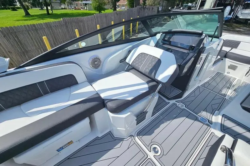 Slide: The Image of 2026 Monterey M-45 boat interior with sleek seating and modern dashboard design. - 11