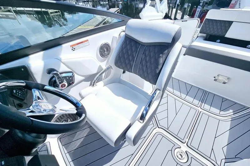 Slide: The Image of Luxury interior of 2026 Monterey M-45 boat with sleek seating and modern controls. - 14