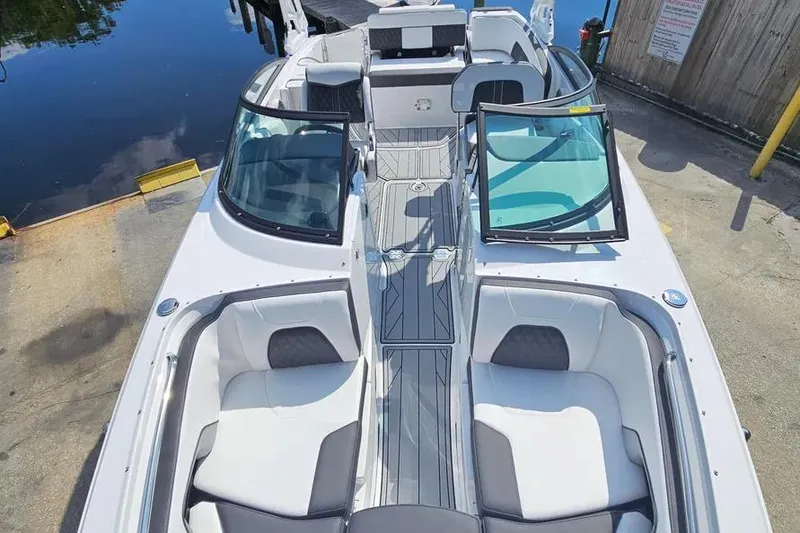 Slide: The Image of 2026 Monterey M-45 boat with sleek design and spacious seating at dockside. - 17