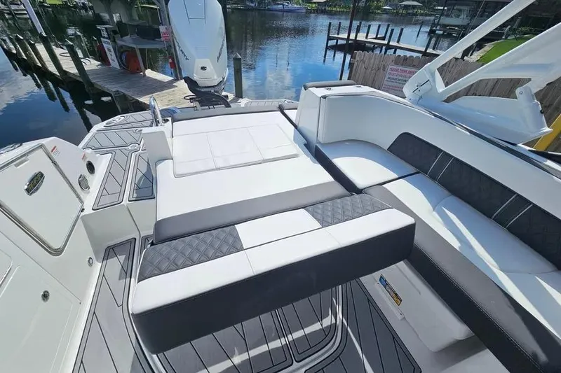 Slide: The Image of Luxurious seating on 2026 Monterey M-45 boat, docked by serene waterfront. - 5