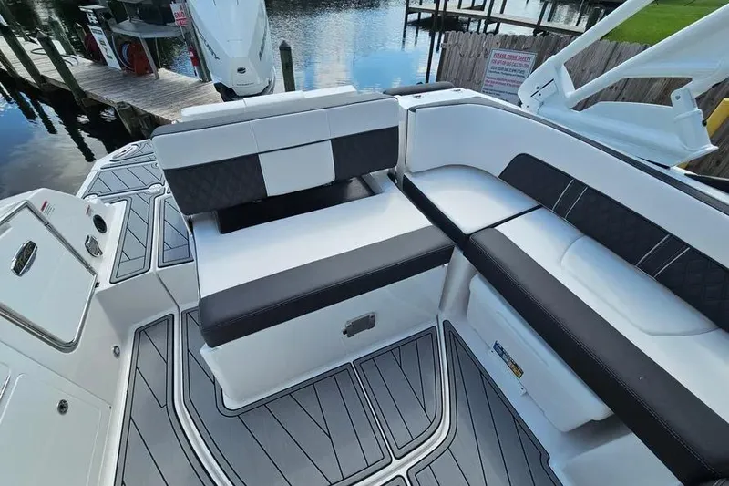 Slide: The Image of Luxury seating on 2026 Monterey M-45 boat, featuring sleek design and waterfront view. - 6