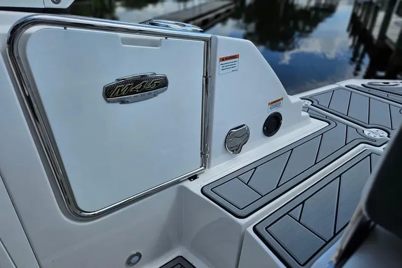 Slide: The Image of 2026 Monterey M-45 boat deck with sleek design and chrome accents. - 9