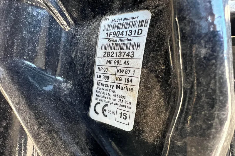 Slide: The Image of Close-up of a 2016 Lund 1675 Impact Sport boat propeller on pavement. - 28