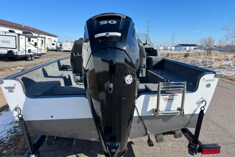 Slide: The Image of 2016 Lund 1675 Impact Sport boat with Mercury outboard motor on trailer. - 3