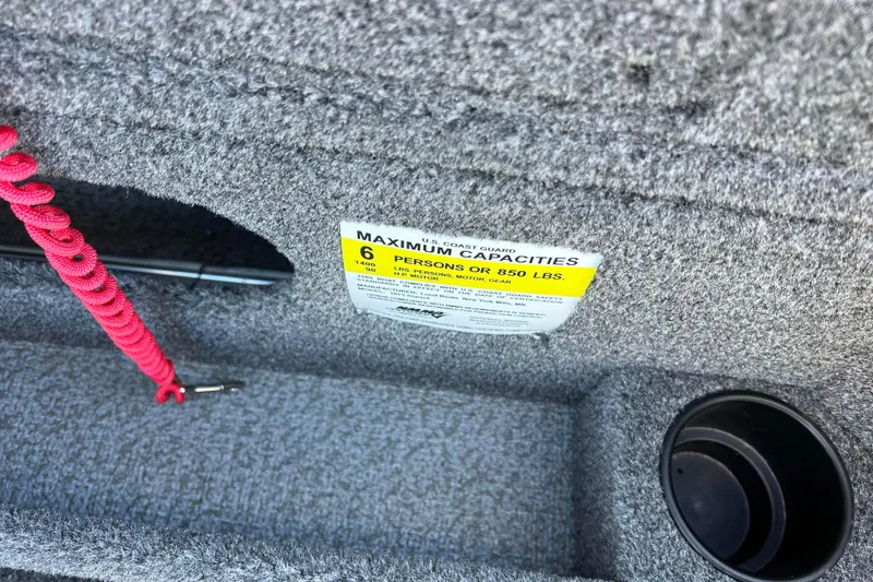 Slide: The Image of Dashboard of 2016 Lund 1675 Impact Sport boat with gauges and steering wheel. - 32