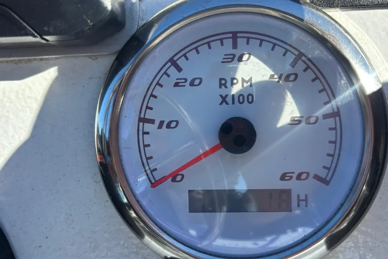 Slide: The Image of Tachometer of Custom FS 14, 2025 model, showing RPM and hours. - 12