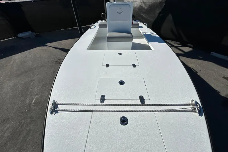 Slide: The Image of Custom FS 14 boat, 2025 model, featuring a sleek white deck design. - 15