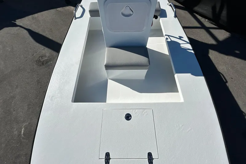 Slide: The Image of Custom FS 14 boat interior, 2025 model, featuring a sleek white deck and seating. - 16