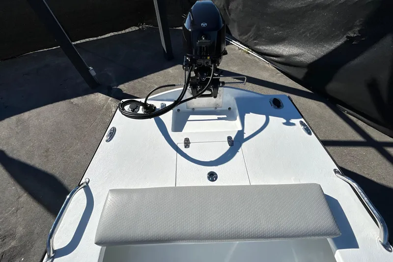 Slide: The Image of Custom FS 14 boat, 2025 model, featuring a sleek white deck and modern outboard motor. - 19