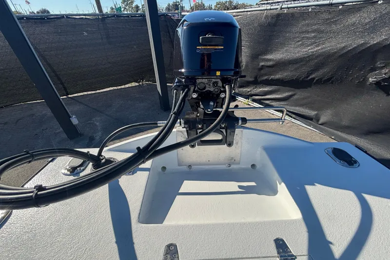 Slide: The Image of Custom FS 14 boat engine, 2025 model, displayed outdoors with cables and controls. - 20