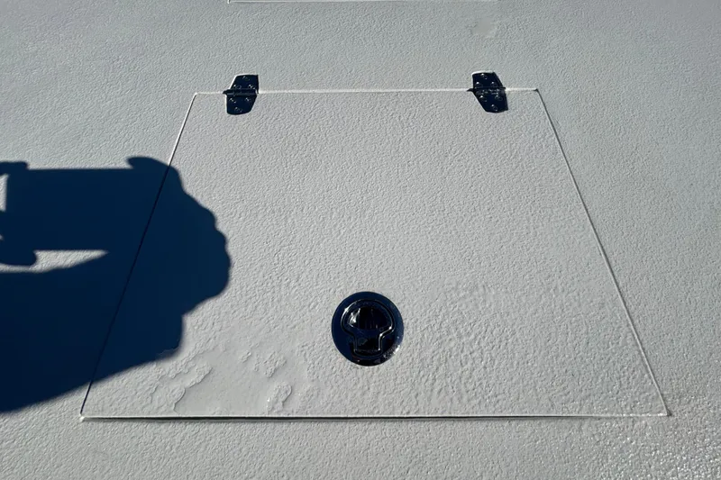 Slide: The Image of Custom FS 14 2025 hatch with metal hinges and circular handle on textured surface. - 33