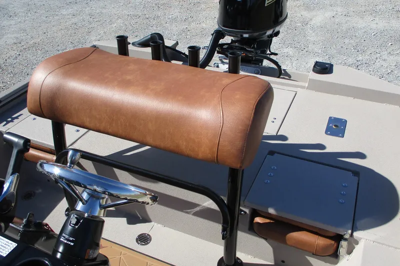 Slide: The Image of 2026 Avid 207 Recon boat interior with brown leather seat and steering wheel. - 17