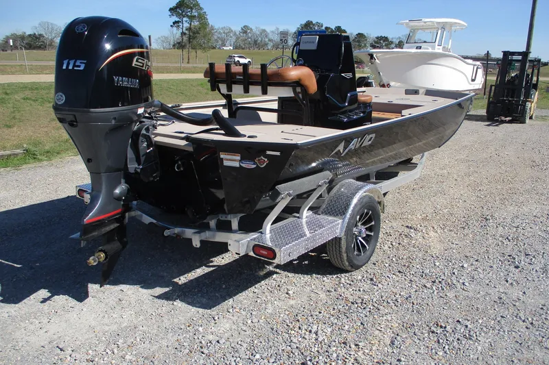 Slide: The Image of Avid 207 Recon 2026 boat on trailer with Yamaha outboard motor, parked outdoors. - 7
