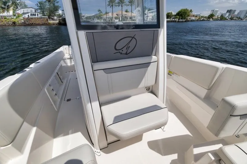 Slide: The Image of Interior of 2026 Sailfish 252 CC boat on the water. - 6