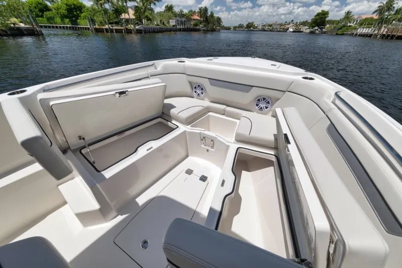 Slide: The Image of 2026 Sailfish 252 CC boat interior with open storage compartments. - 7