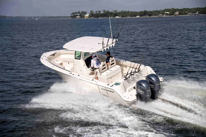 Slide: The Image of Sailfish 272 CC 2026 boat on water with dual outboard engines. - 5