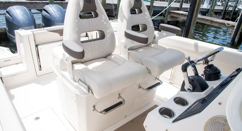 Slide: The Image of Interior of 2026 Sailfish 272 CC featuring luxurious seating. - 8