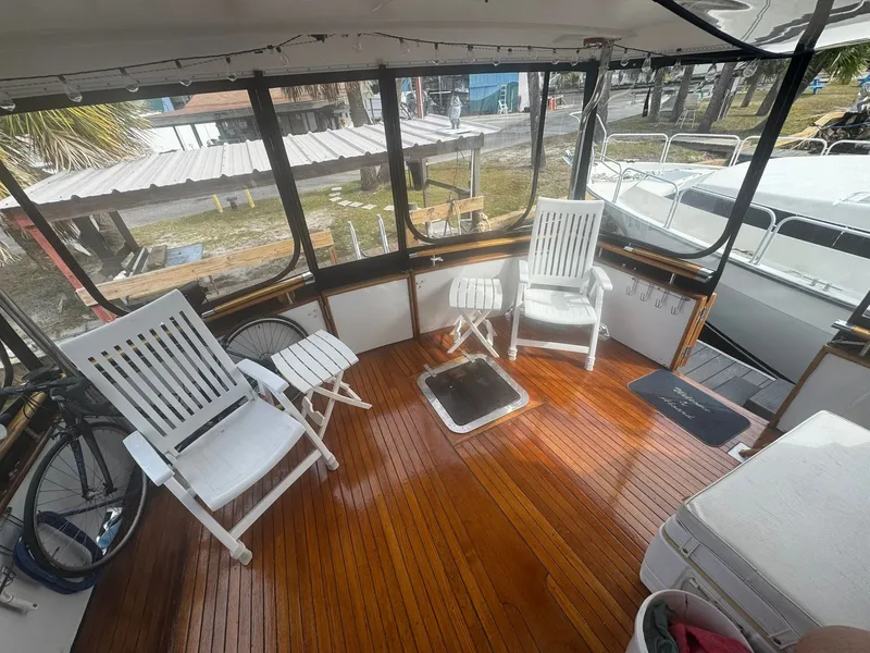 Slide: The Image of Interior of a 1987 President 41 Double Cabin yacht with wooden flooring. - 16