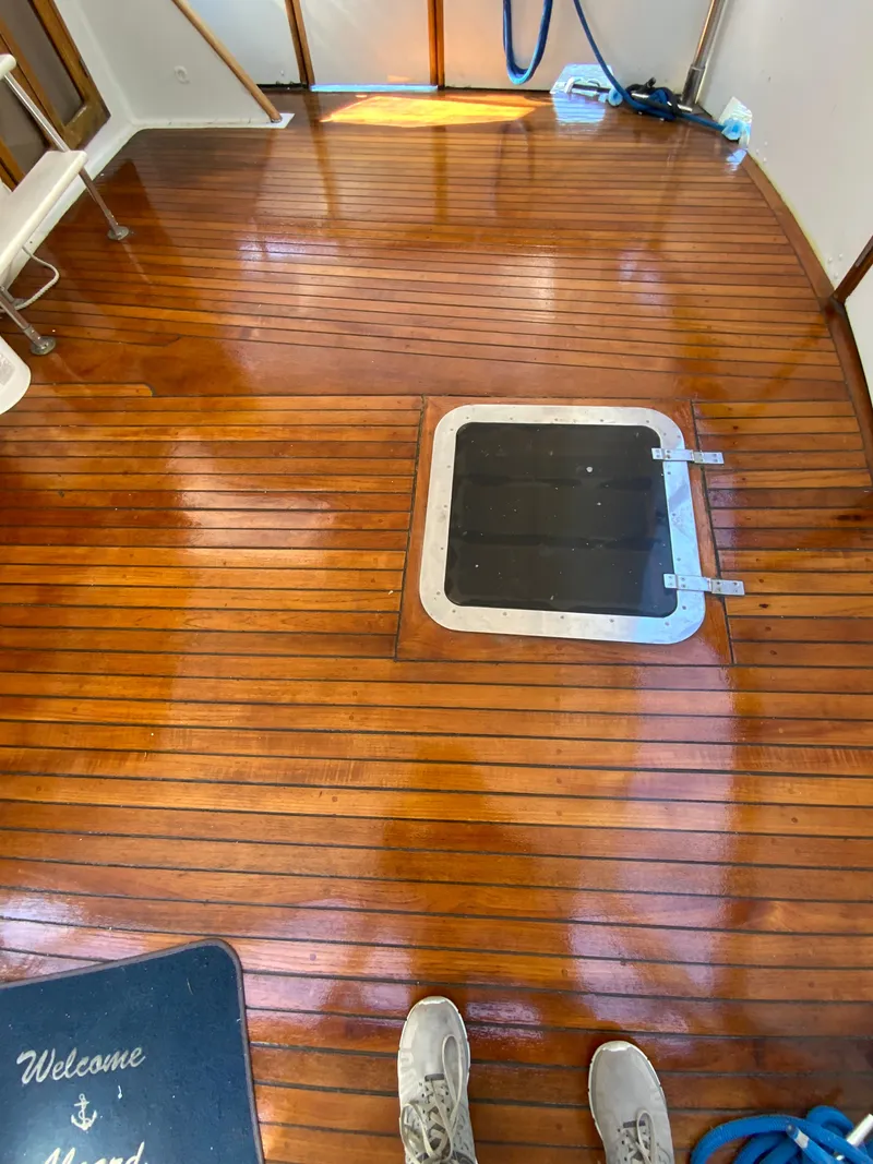 Slide: The Image of Wooden deck of a 1987 President 41 Double Cabin boat. - 19