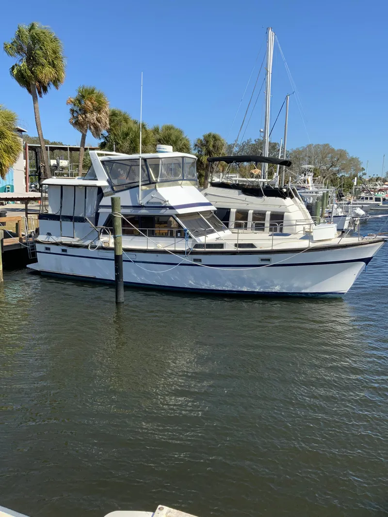 Slide: The Image of 1987 President 41 Double Cabin Yacht docked in harbor. - 2