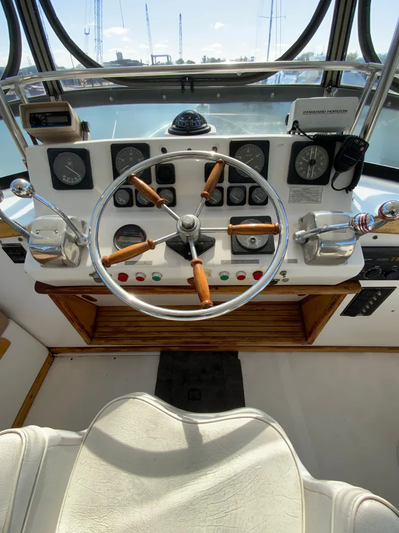 Slide: The Image of Helm of a 1987 President 41 Double Cabin yacht. - 25