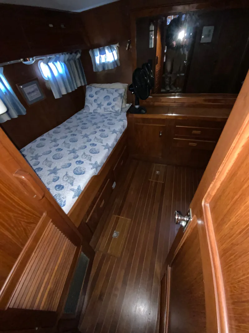 Slide: The Image of Interior of 1987 President 41 Double Cabin yacht. - 38