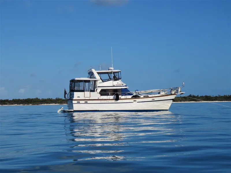 Slide: The Image of 1987 President 41 Double Cabin on calm water. - 4