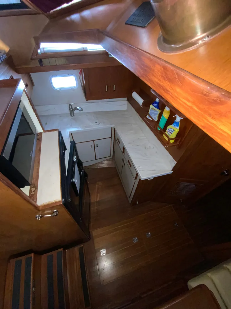 Slide: The Image of Galley area of a 1987 President 41 Double Cabin yacht. - 49