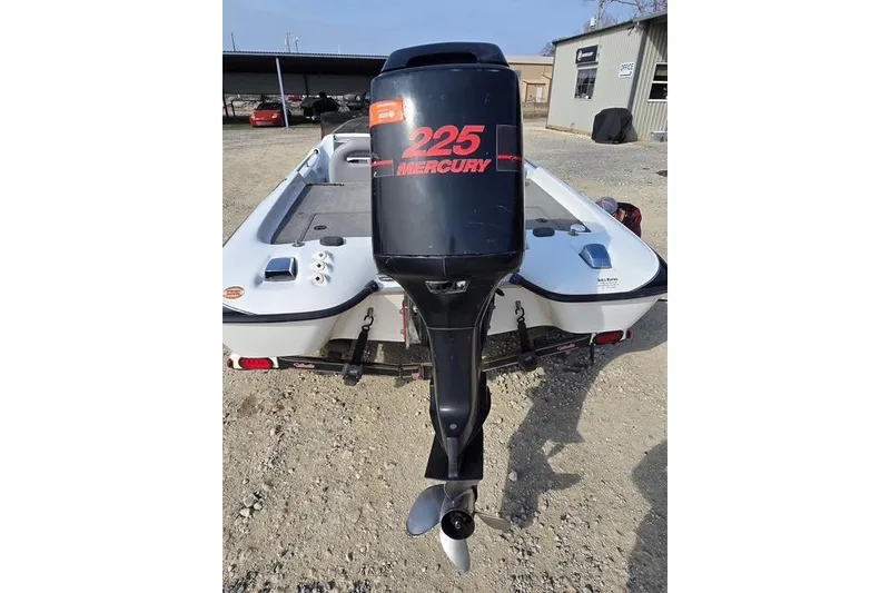 Slide: The Image of 2001 Bass Cat Cougar boat with Mercury 225 outboard motor, rear view. - 8
