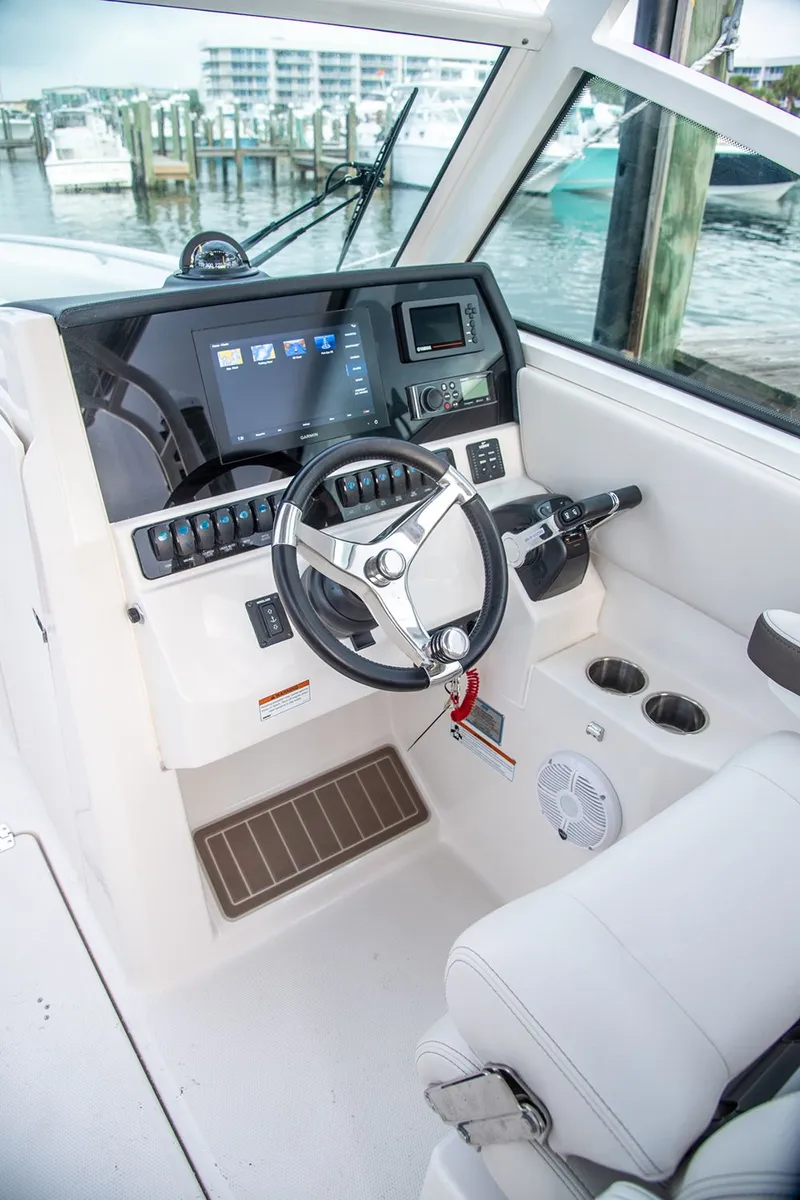 Slide: The Image of Interior view of 2026 Sailfish 276 DC boat cockpit. - 10