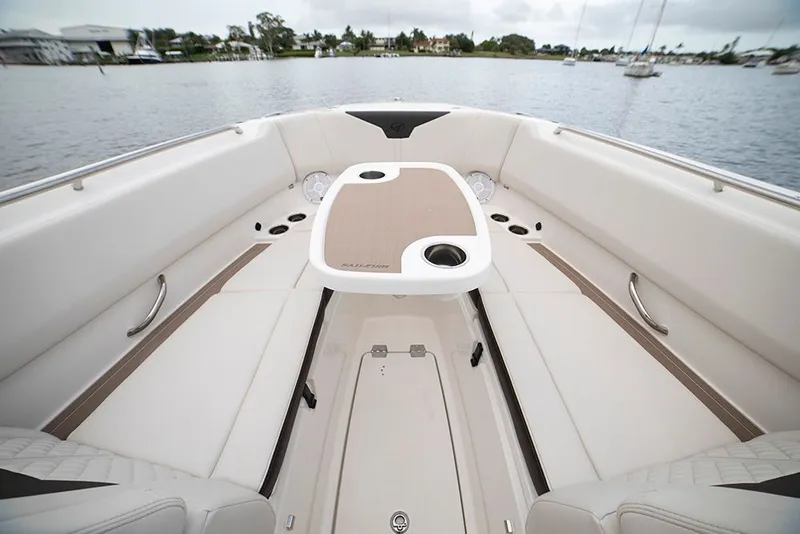 Slide: The Image of Interior view of 2026 Sailfish 276 DC boat on calm water. - 12