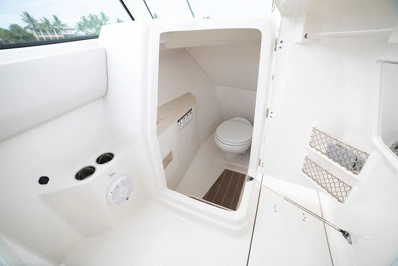 Slide: The Image of Interior of Sailfish 276 DC 2026 with toilet. - 4