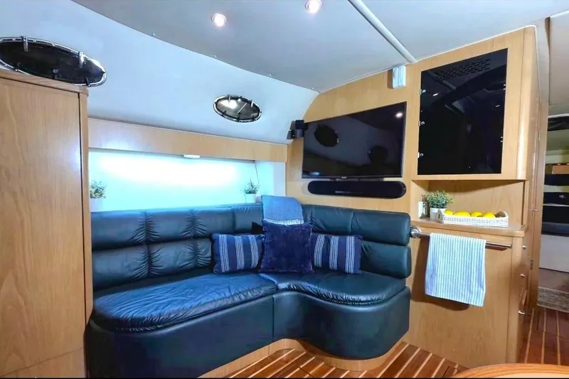 Slide: The Image of Luxurious interior of 1997 Tiara Yachts 4000 Express with leather seating and modern amenities. - 15