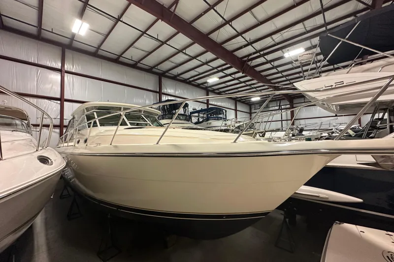 Slide: The Image of 1997 Tiara Yachts 4000 Express in indoor storage, showcasing sleek design and craftsmanship. - 3