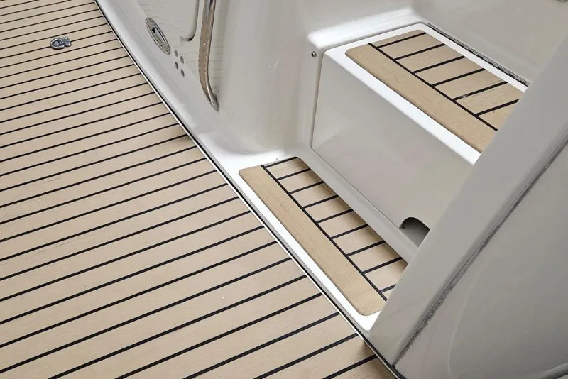 Slide: The Image of 1997 Tiara Yachts 4000 Express, teak deck detail with non-slip surface. - 7