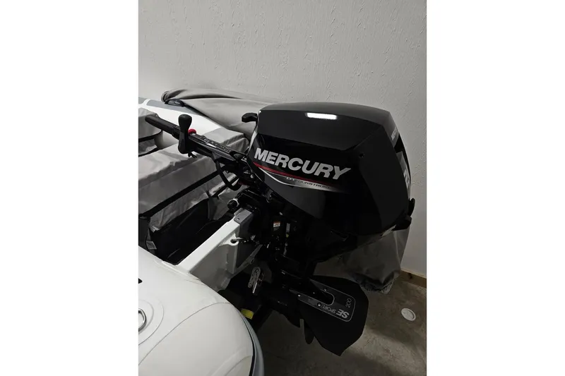 Slide: The Image of Mercury outboard motor on a 1997 Tiara Yachts 4000 Express boat. - 9