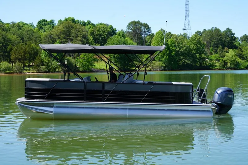 Slide: The Image of Top view layout of 2026 Berkshire 24 RFX LE pontoon boat, showcasing seating and helm. - 18