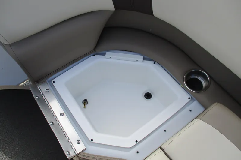 Slide: The Image of SunCatcher Select 22SL 2026 boat seating with integrated storage and cup holder. - 18