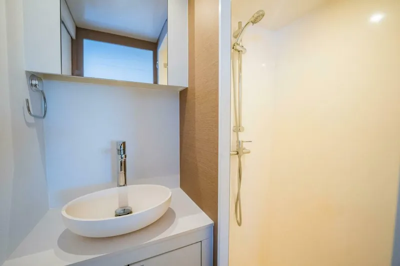 Slide: The Image of Modern bathroom with sleek sink and shower in NEEL 51, 2020 model. - 25